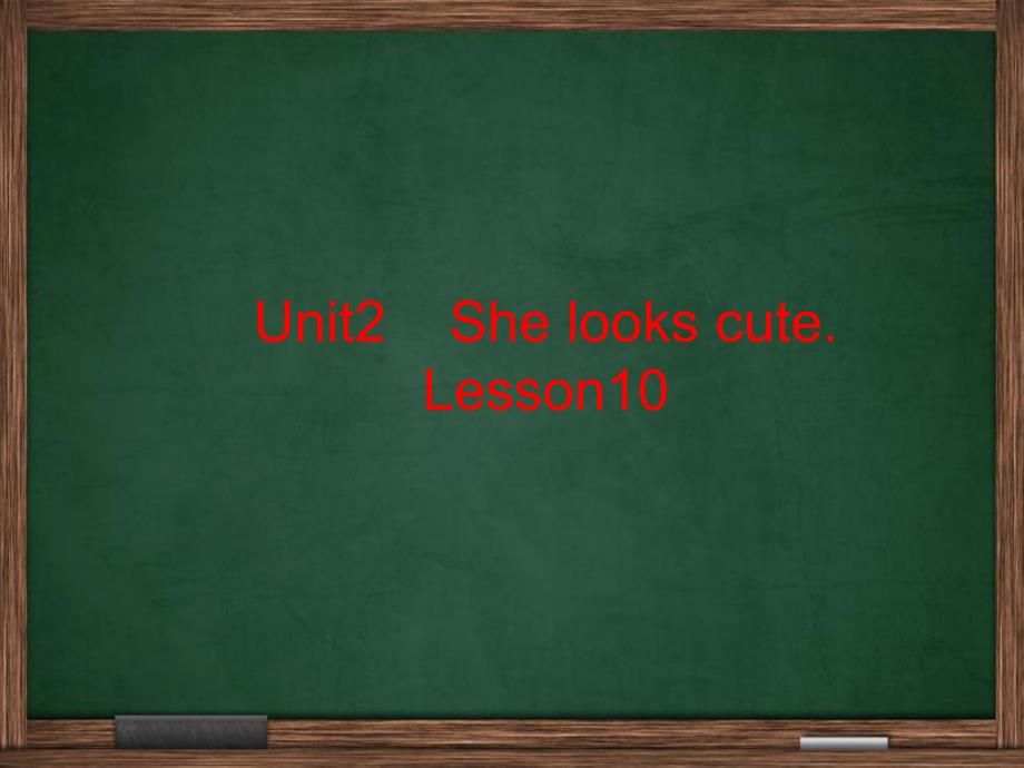五年级上册英语课件Unit 2She looks cuteLesson 10 人教精通_第1页