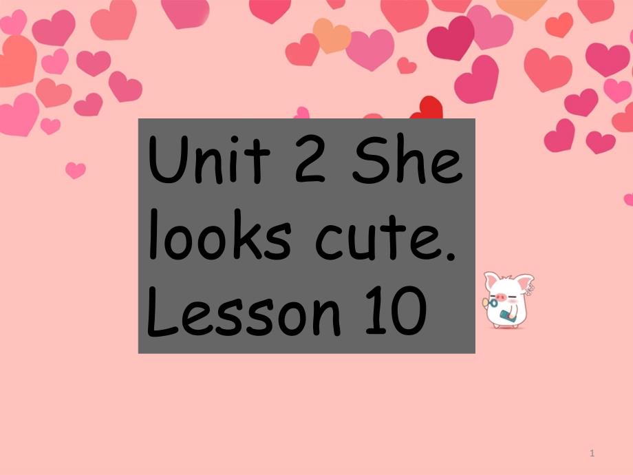 人教精通版五年级上册英语Unit-2-She-looks-cute-Lesson-10-课件_第1页